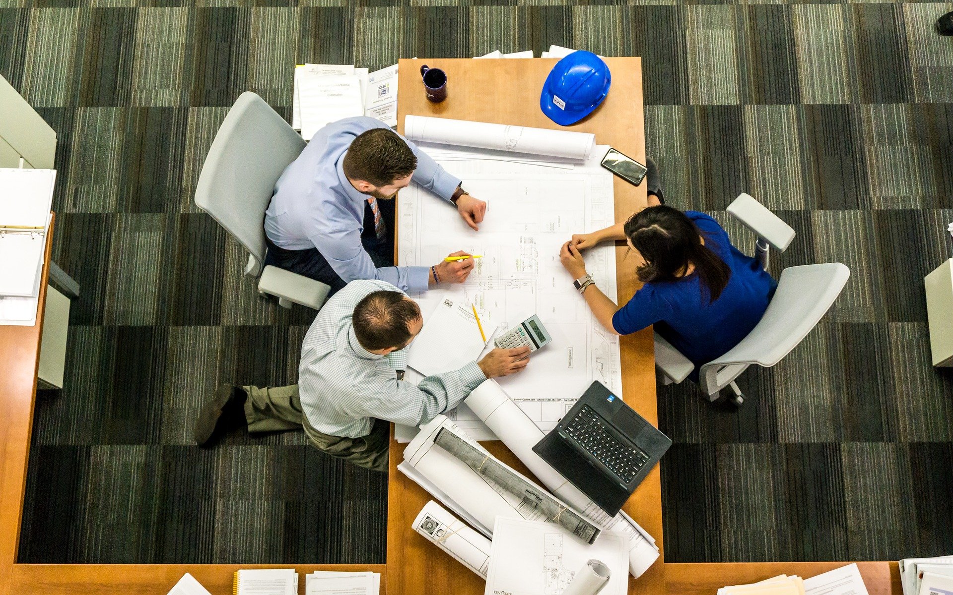 office worker sitting around table